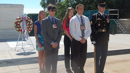 Young People Stand at the Tomb of the Unknown Soldier at Arlington National Cemetery